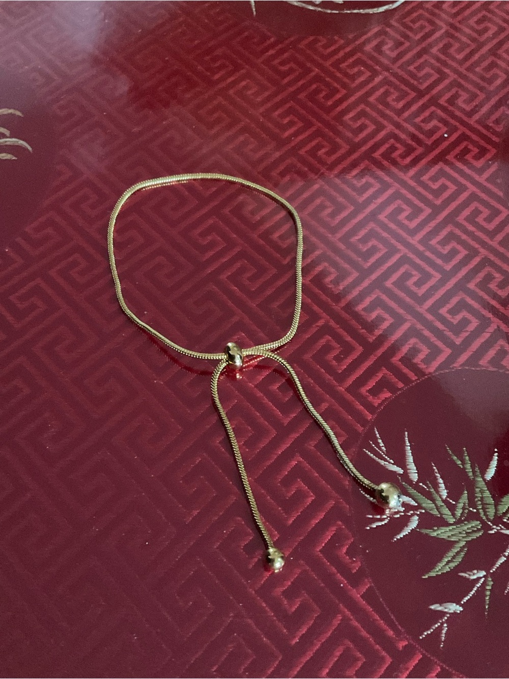 Adjustable Gold-Tone Slide Bracelet *has flaw*